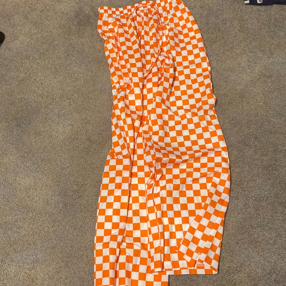 Orange and white checkered pants